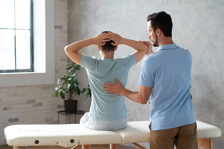 medium-shot-man-helping-patient-physiotherapy_23-2149047562 (2)
